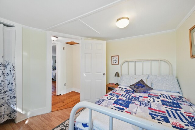 30 Pine St, Thomaston, ME 04861 - bedroom with ornamental molding, wood finished floors, and baseboards