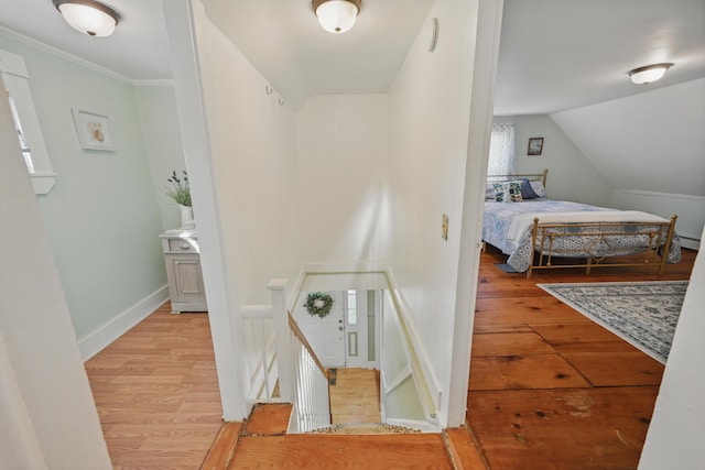 30 Pine St, Thomaston, ME 04861 - bedroom with baseboards, wood finished floors, and lofted ceiling