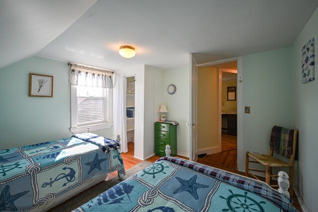 30 Pine St, Thomaston, ME 04861 - bedroom with a walk in closet and light wood-style floors