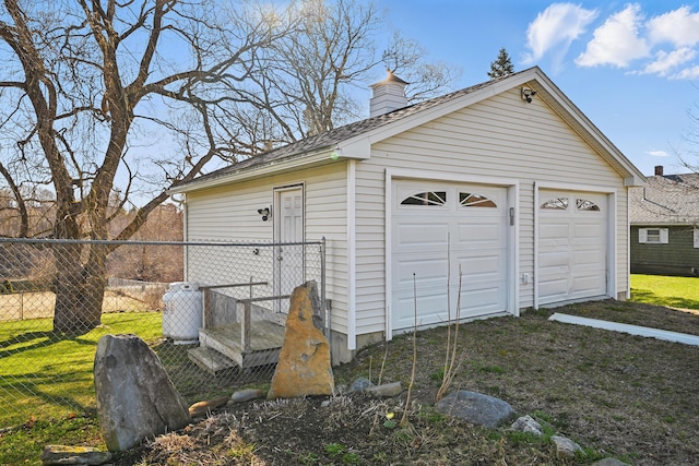 30 Pine St, Thomaston, ME 04861 - detached garage featuring fence