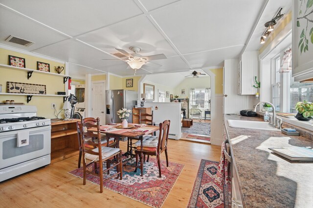 30 Pine St, Thomaston, ME 04861 - dining space featuring a ceiling fan, visible vents, and light wood-type flooring