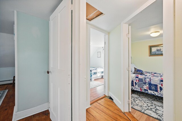 30 Pine St, Thomaston, ME 04861 - hall with baseboards, wood finished floors, a baseboard heating unit, and attic access