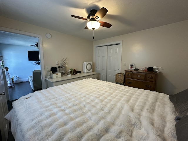 bedroom featuring a ceiling fan and a closet
