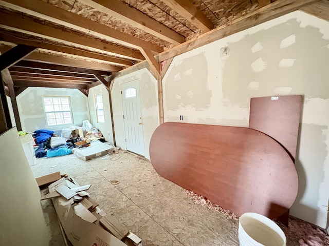miscellaneous room with vaulted ceiling