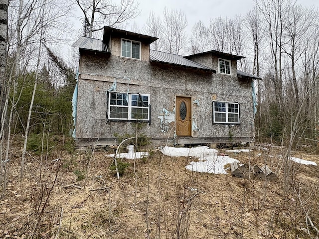 view of front of home featuring metal roof