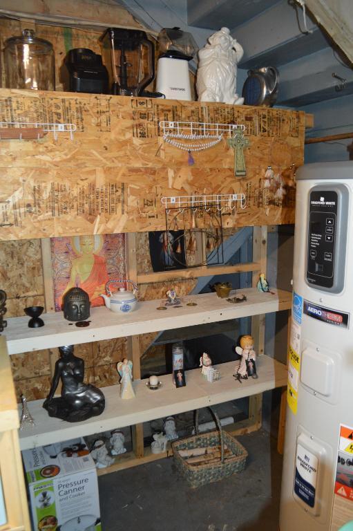 storage room featuring water heater