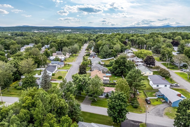 102 New Hampshire St, Millinocket, ME 04462 - aerial view of residential area featuring a heavily wooded area