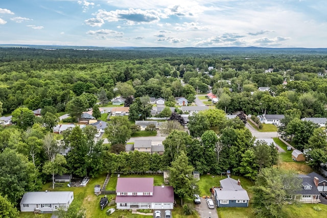 102 New Hampshire St, Millinocket, ME 04462 - aerial perspective of suburban area with a heavily wooded area