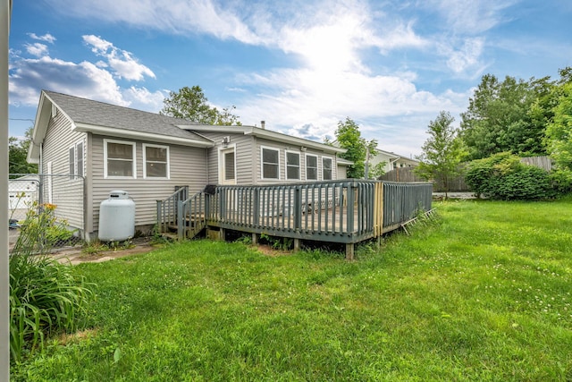 102 New Hampshire St, Millinocket, ME 04462 - back of house with a wooden deck and a shingled roof