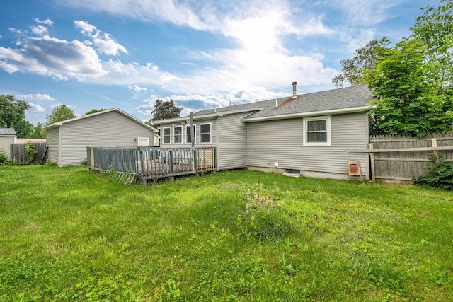 102 New Hampshire St, Millinocket, ME 04462 - rear view of house featuring a deck and roof with shingles