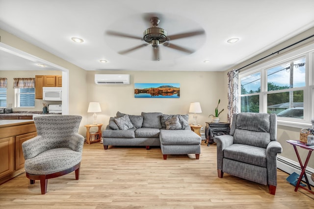 102 New Hampshire St, Millinocket, ME 04462 - living room featuring a wall unit AC, a ceiling fan, light wood-style floors, plenty of natural light, and recessed lighting