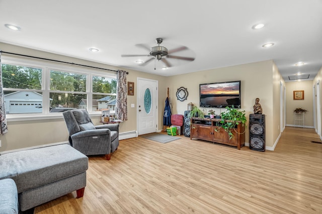 102 New Hampshire St, Millinocket, ME 04462 - living room featuring attic access, light wood finished floors, ceiling fan, a baseboard radiator, and recessed lighting