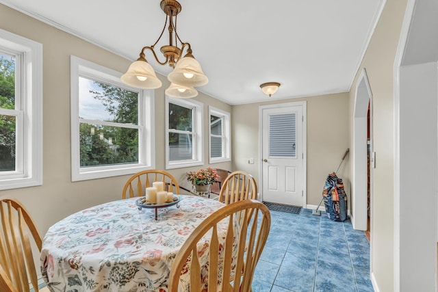 102 New Hampshire St, Millinocket, ME 04462 - dining space featuring light tile patterned flooring and ornamental molding