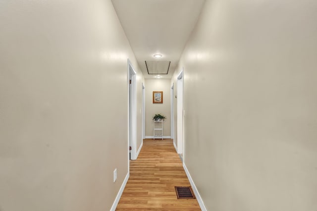 102 New Hampshire St, Millinocket, ME 04462 - hall featuring attic access and light wood-type flooring