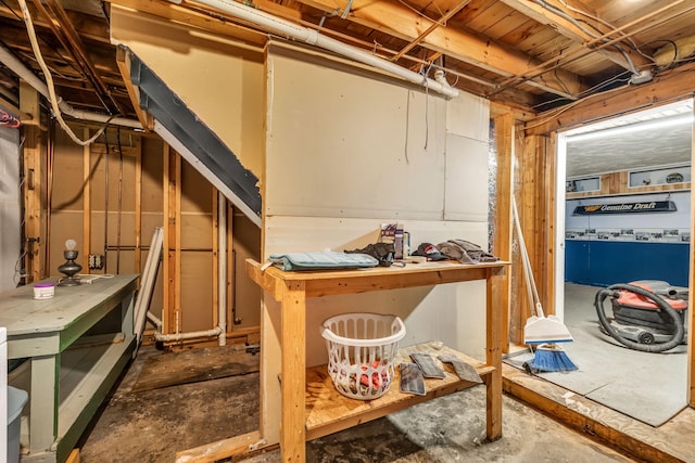 102 New Hampshire St, Millinocket, ME 04462 - unfinished below grade area featuring a workshop area
