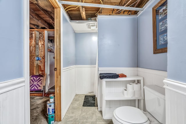 102 New Hampshire St, Millinocket, ME 04462 - bathroom with wainscoting and tile patterned flooring