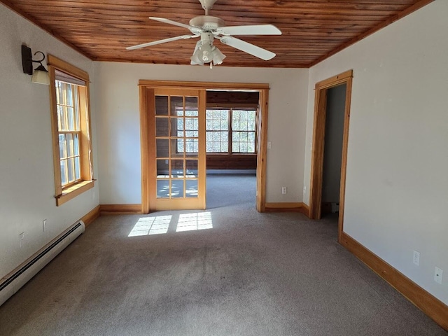 unfurnished room featuring a baseboard heating unit, a ceiling fan, wooden ceiling, and baseboards