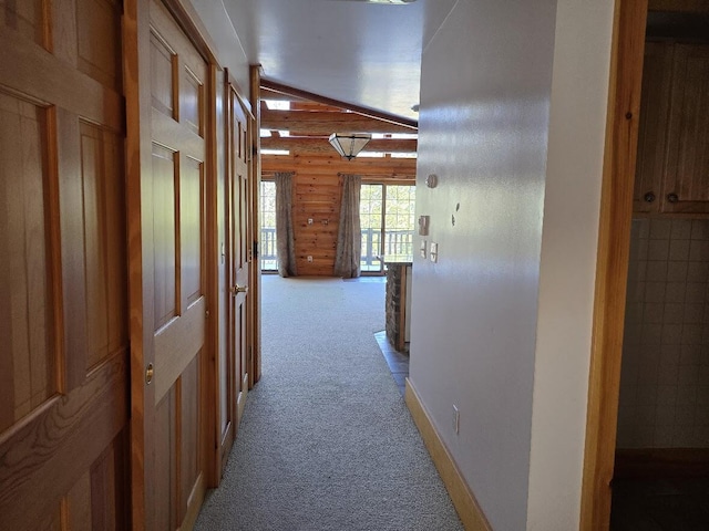 hall with carpet flooring