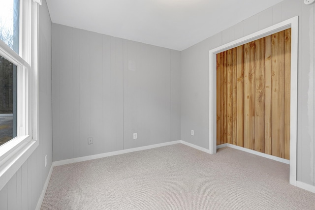 155 Saco Rd, Hollis, ME 04042 - carpeted empty room with plenty of natural light and baseboards