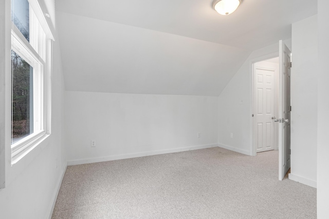 155 Saco Rd, Hollis, ME 04042 - bonus room with light carpet, vaulted ceiling, plenty of natural light, and baseboards