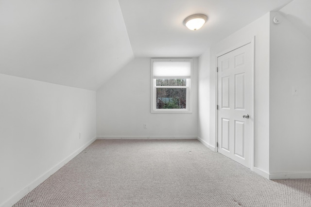 155 Saco Rd, Hollis, ME 04042 - additional living space featuring carpet flooring, vaulted ceiling, and baseboards