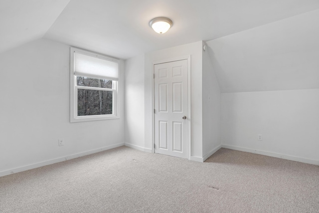 155 Saco Rd, Hollis, ME 04042 - bonus room featuring vaulted ceiling, carpet floors, and baseboards