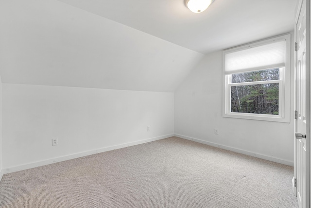 155 Saco Rd, Hollis, ME 04042 - bonus room featuring carpet floors, lofted ceiling, and baseboards