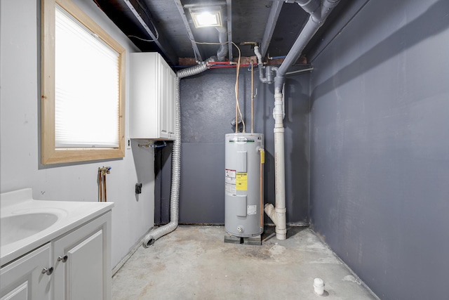 155 Saco Rd, Hollis, ME 04042 - utilities with water heater and a sink
