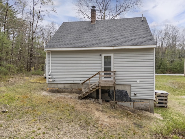 155 Saco Rd, Hollis, ME 04042 - back of house with a chimney and a shingled roof