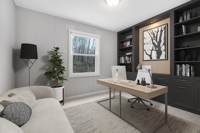 155 Saco Rd, Hollis, ME 04042 - home office featuring built in shelves, baseboards, and light carpet