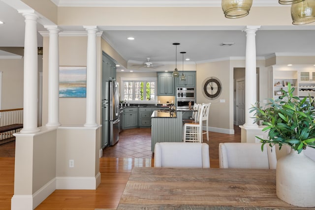 kitchen featuring gray cabinets, recessed lighting, stainless steel appliances, ceiling fan, and dark countertops