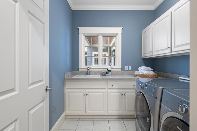 laundry room with separate washer and dryer, light tile patterned floors, cabinet space, a sink, and crown molding