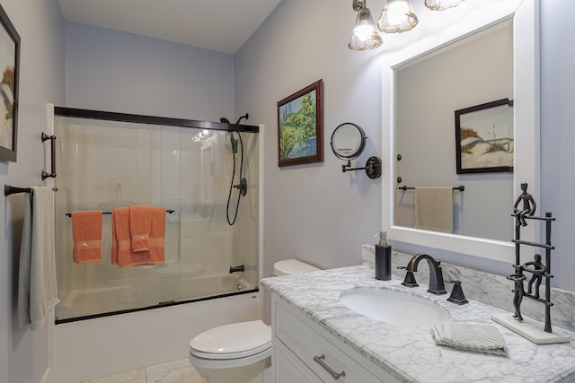 bathroom with shower / bath combination with glass door, toilet, vanity, a notable chandelier, and marble finish floor