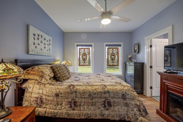 bedroom featuring ceiling fan and wood finished floors