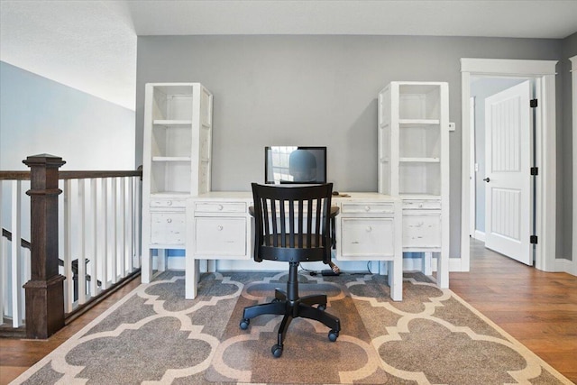 home office featuring dark wood-style floors