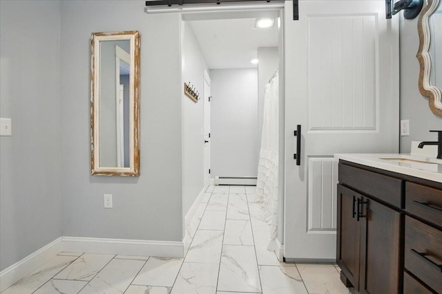 full bathroom featuring vanity, marble finish floor, recessed lighting, baseboards, and a baseboard radiator