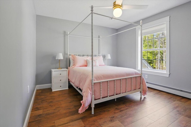 bedroom with baseboards, ceiling fan, wood finished floors, and baseboard heating