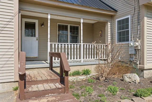205 Patterson Rd, Limerick, ME 04048 - doorway to property featuring covered porch and metal roof