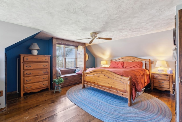 205 Patterson Rd, Limerick, ME 04048 - bedroom with a ceiling fan, a textured ceiling, lofted ceiling, and hardwood / wood-style flooring
