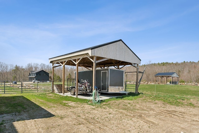 205 Patterson Rd, Limerick, ME 04048 - exterior space featuring fence, an outbuilding, and a detached carport
