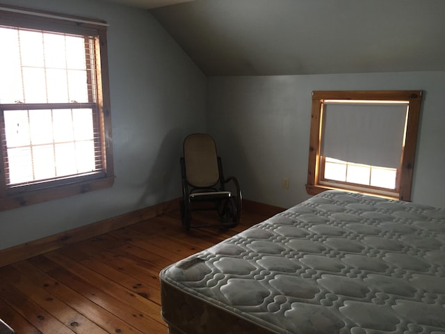 205 Patterson Rd, Limerick, ME 04048 - bedroom with baseboards, vaulted ceiling, and hardwood / wood-style flooring