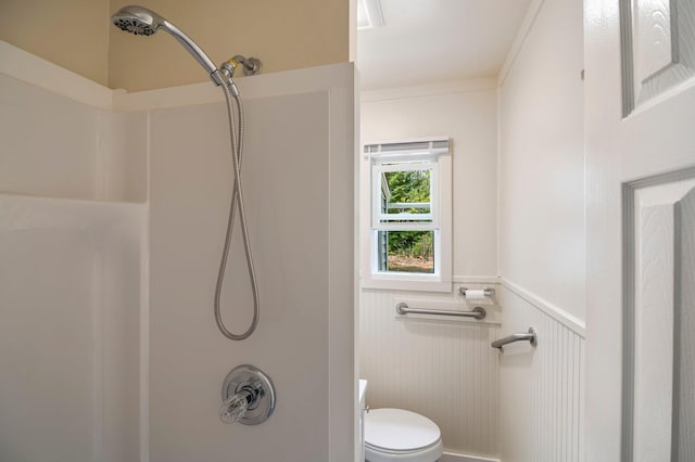 518 Ossipee Trl E, Gorham, ME 04038 - bathroom with a shower, toilet, and a wainscoted wall