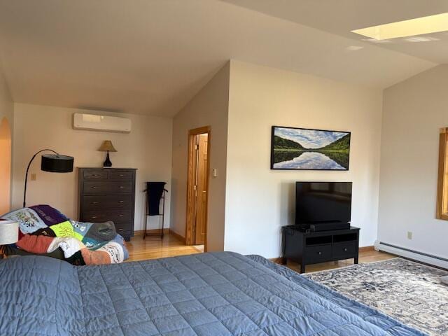 bedroom with lofted ceiling, wood finished floors, baseboards, an AC wall unit, and a baseboard heating unit