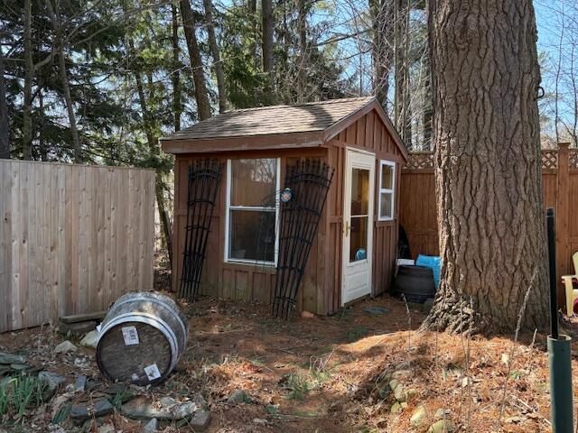 view of shed featuring a fenced backyard