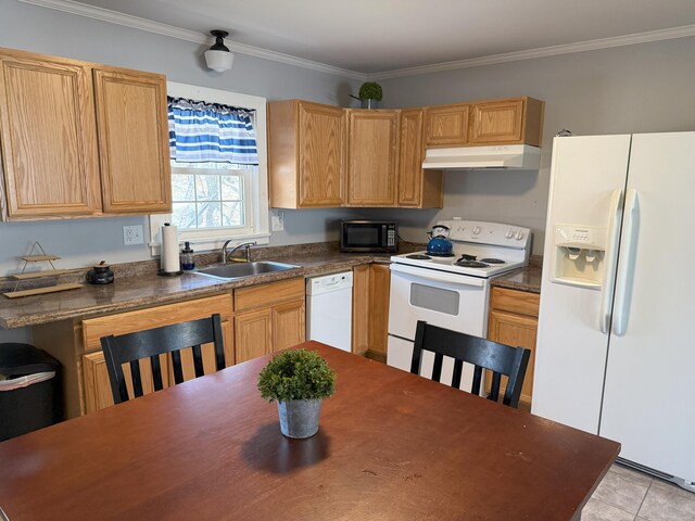 47 New Jersey St, Millinocket, ME 04462 - kitchen featuring dark countertops, white appliances, under cabinet range hood, and a sink
