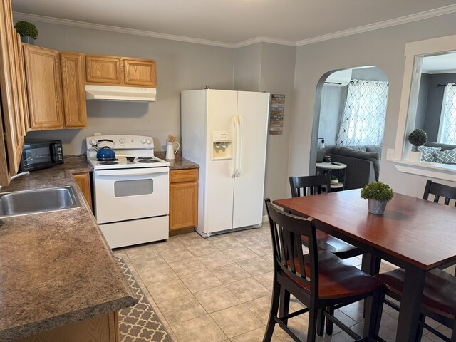 47 New Jersey St, Millinocket, ME 04462 - kitchen featuring crown molding, a sink, arched walkways, under cabinet range hood, and white appliances