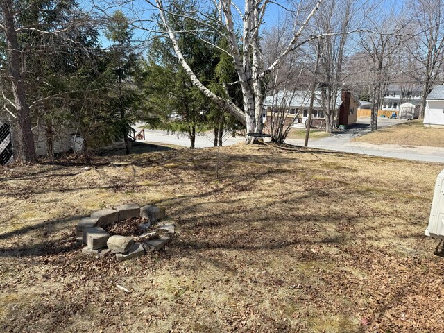 47 New Jersey St, Millinocket, ME 04462 - view of yard featuring a fire pit