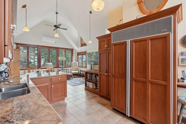 168 Ocean Ave, Kennebunkport, ME 04046 - kitchen featuring ceiling fan, a sink, high vaulted ceiling, paneled built in refrigerator, and pendant lighting