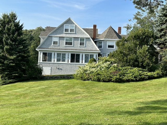 168 Ocean Ave, Kennebunkport, ME 04046 - back of property featuring a yard and a chimney