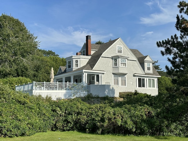 168 Ocean Ave, Kennebunkport, ME 04046 - rear view of house with a gambrel roof, a chimney, and a shingled roof